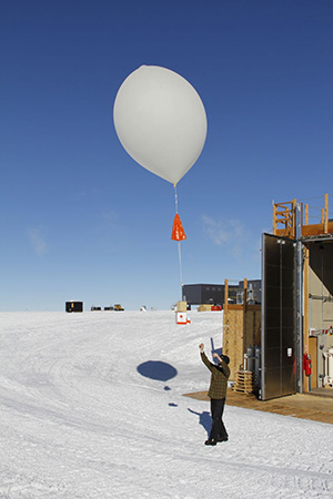 balloon rising with package