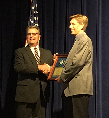 Craig McLean presents Steve Brown with award